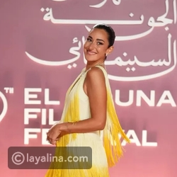 أمينة خليل تتألق بالأصفر والشراشيب في ختام الجونة